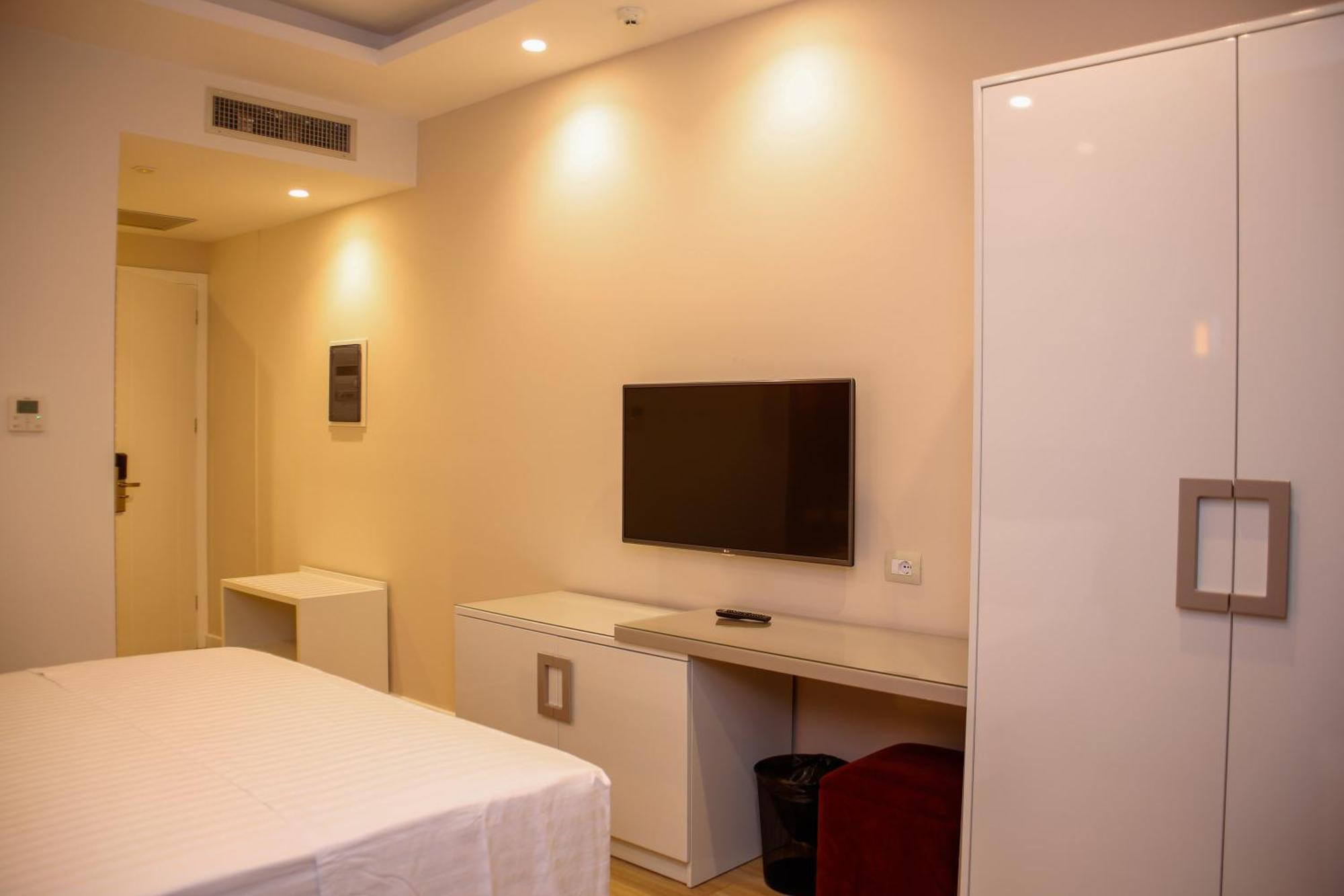 Hotel Luxury Ksamil Quarto foto