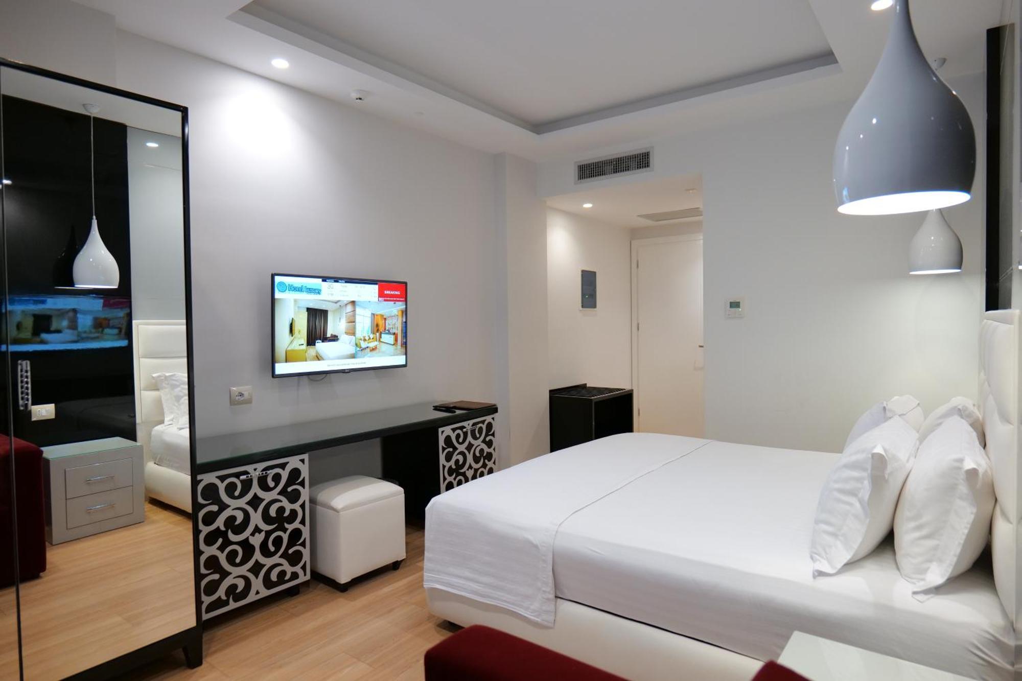 Hotel Luxury Ksamil Quarto foto