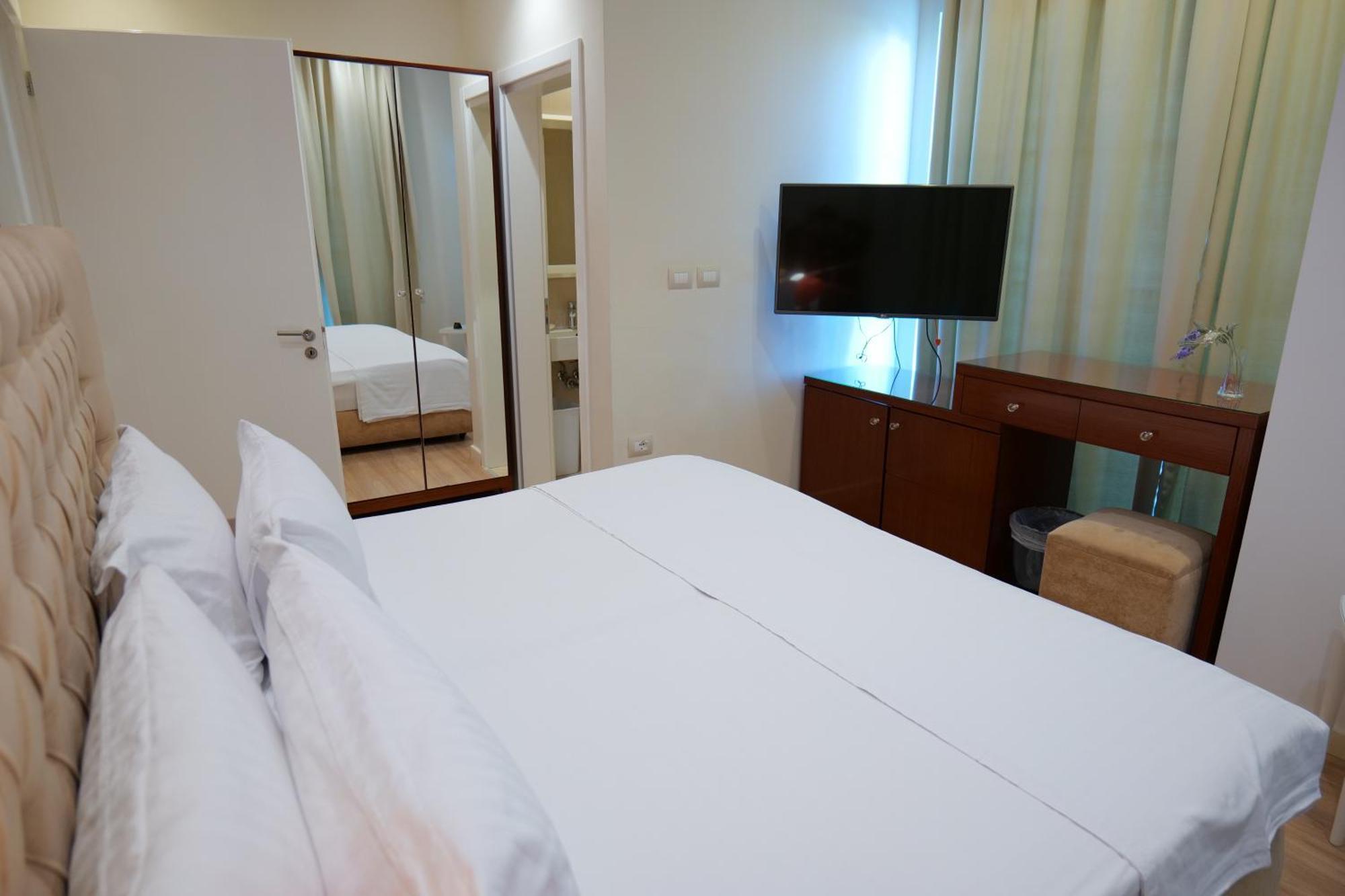 Hotel Luxury Ksamil Quarto foto
