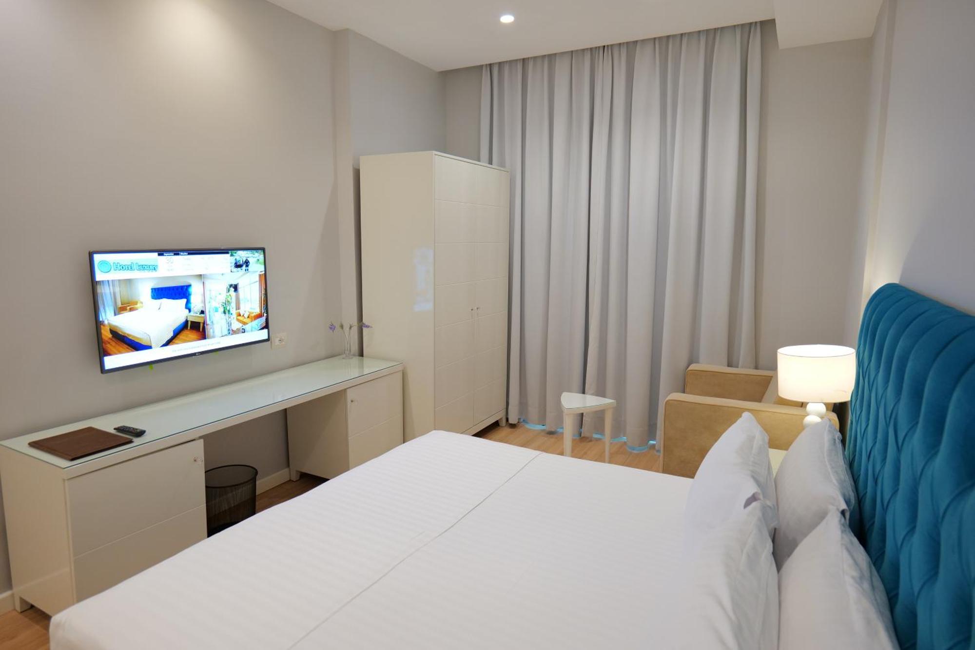 Hotel Luxury Ksamil Quarto foto